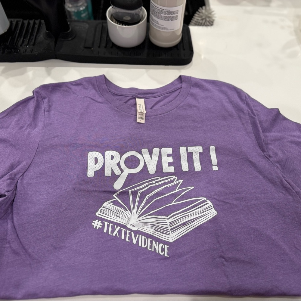 Purple Teacher’s Shirt with 'Prove It!' Design